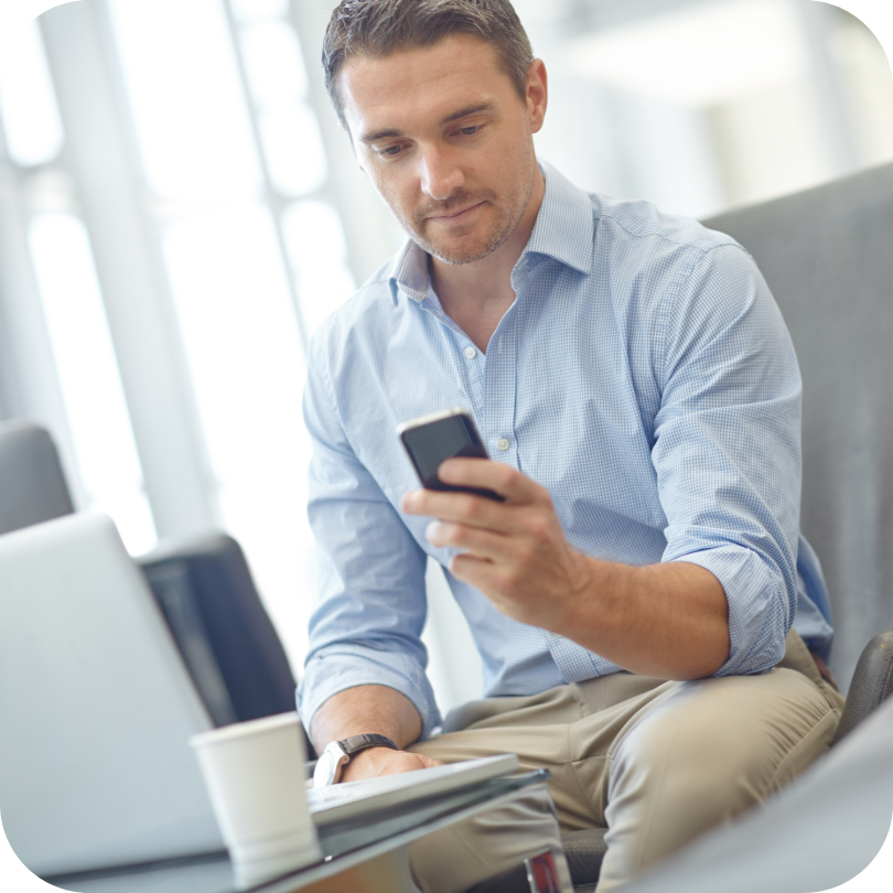 Man looking at improved website metrics from SEO